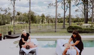 two people undergoing massage treatments by the pool at Nu Leaf Retreat, Hunter Valley