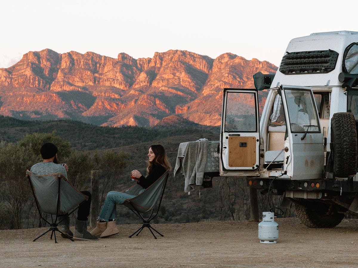 Couple sitting on camping chairs at Bunyeroo Valley Lookout