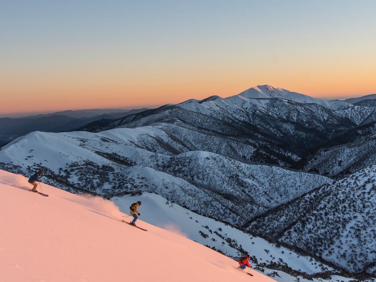 Skiers heading down slopes at Mount Hotham in Victoria