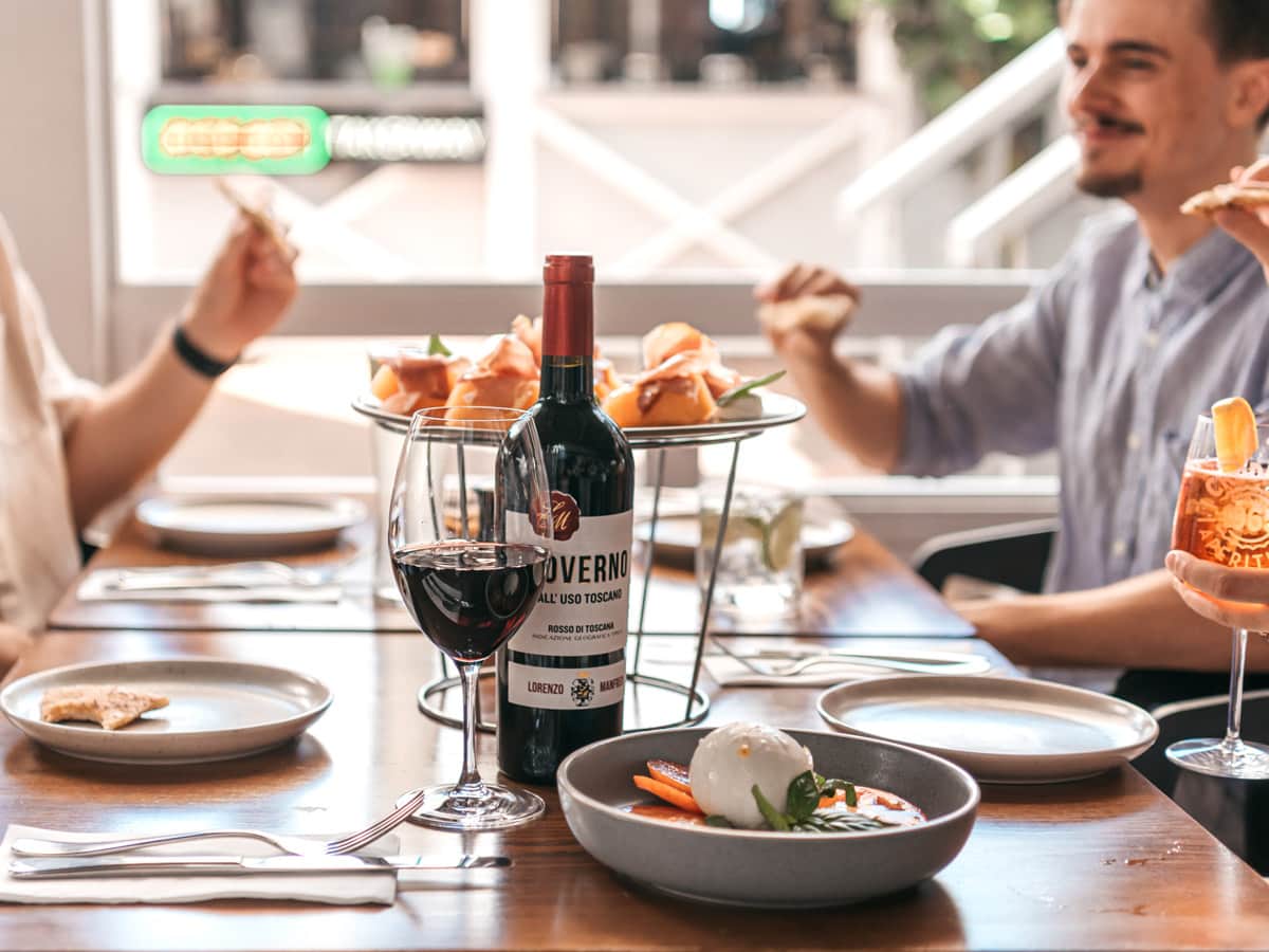 A group dines at Il Vento, Mooloolaba