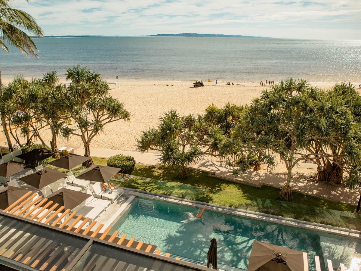 a beachfront swimming pool at Netanya Noosa