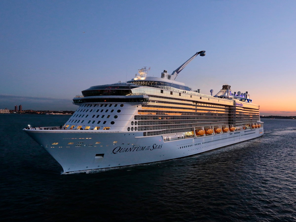 The Royal Caribbean Quantum of the Seas navigating the sea at dusk