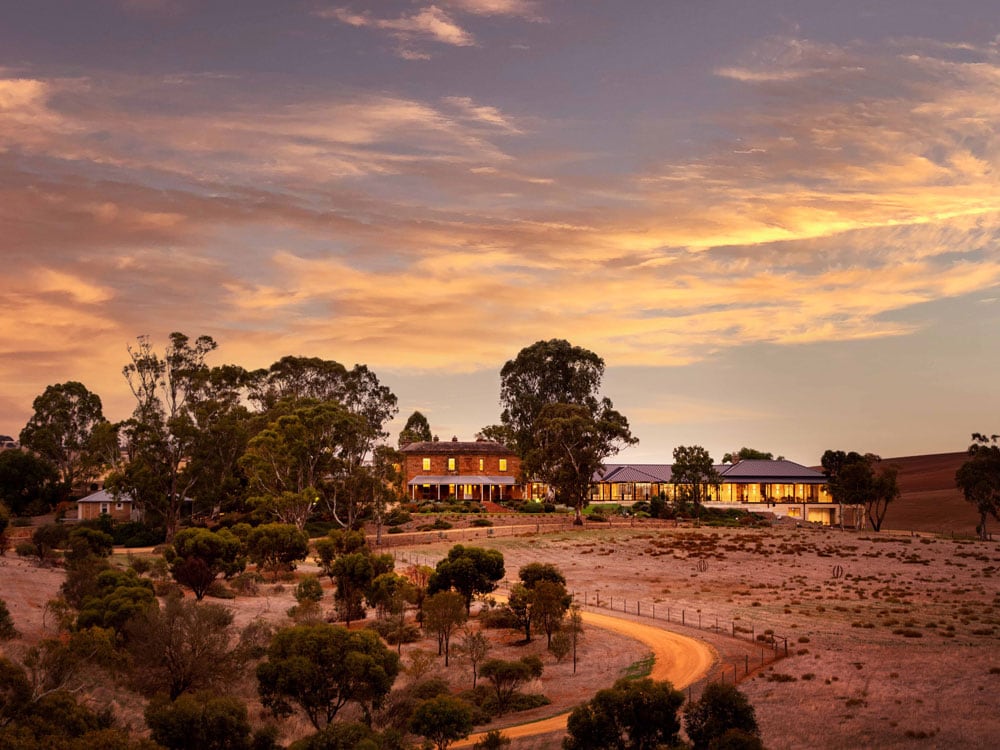 The sun setting over Kingsford the Barossa.