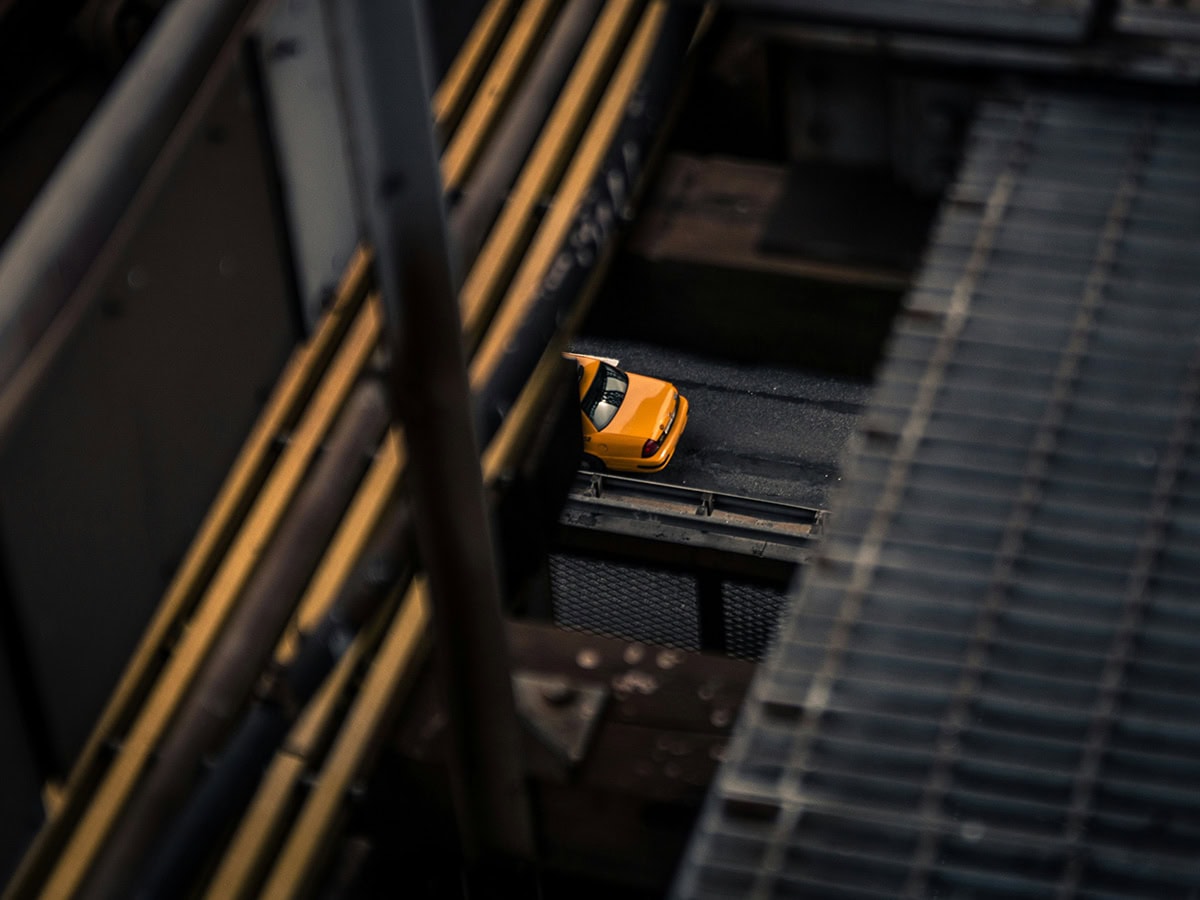 glimpse of a taxi crossing a bridge